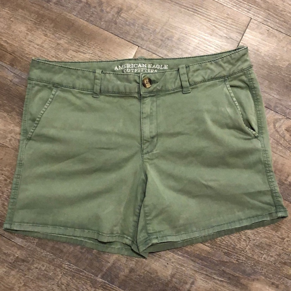 American Eagle Outfitters green shorts.